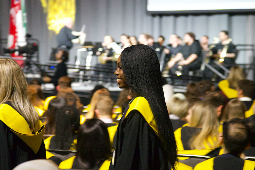 Happy students graduating university